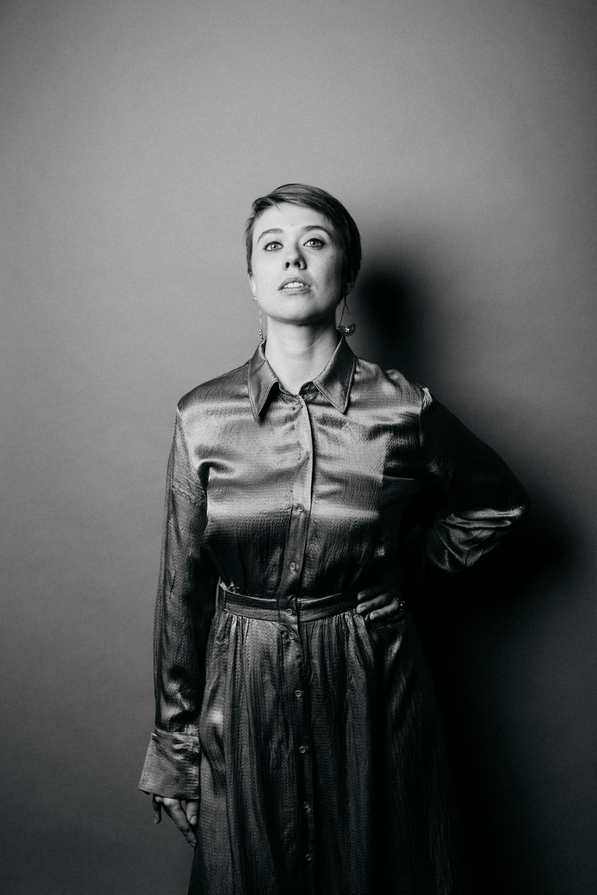 Ada Brodie golden dress b/w confident